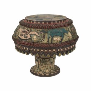 a table with paintings and patterns