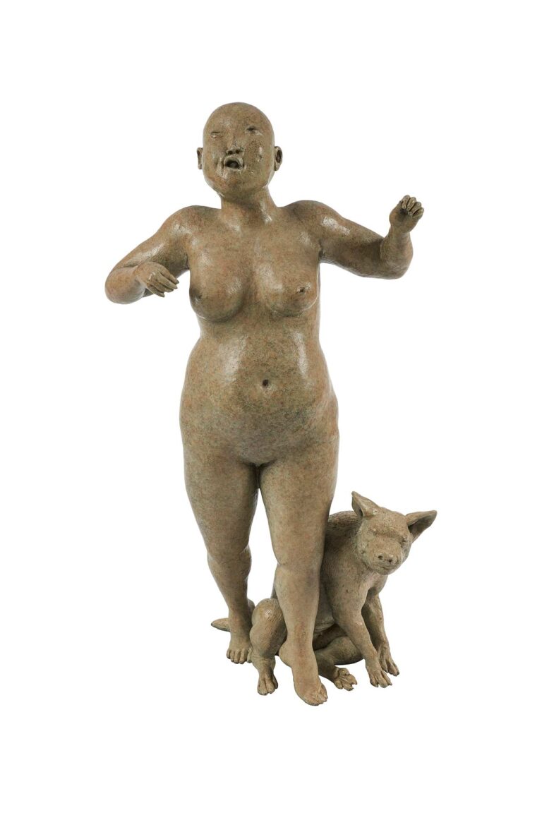 A sculpture of a nude woman with a dog.