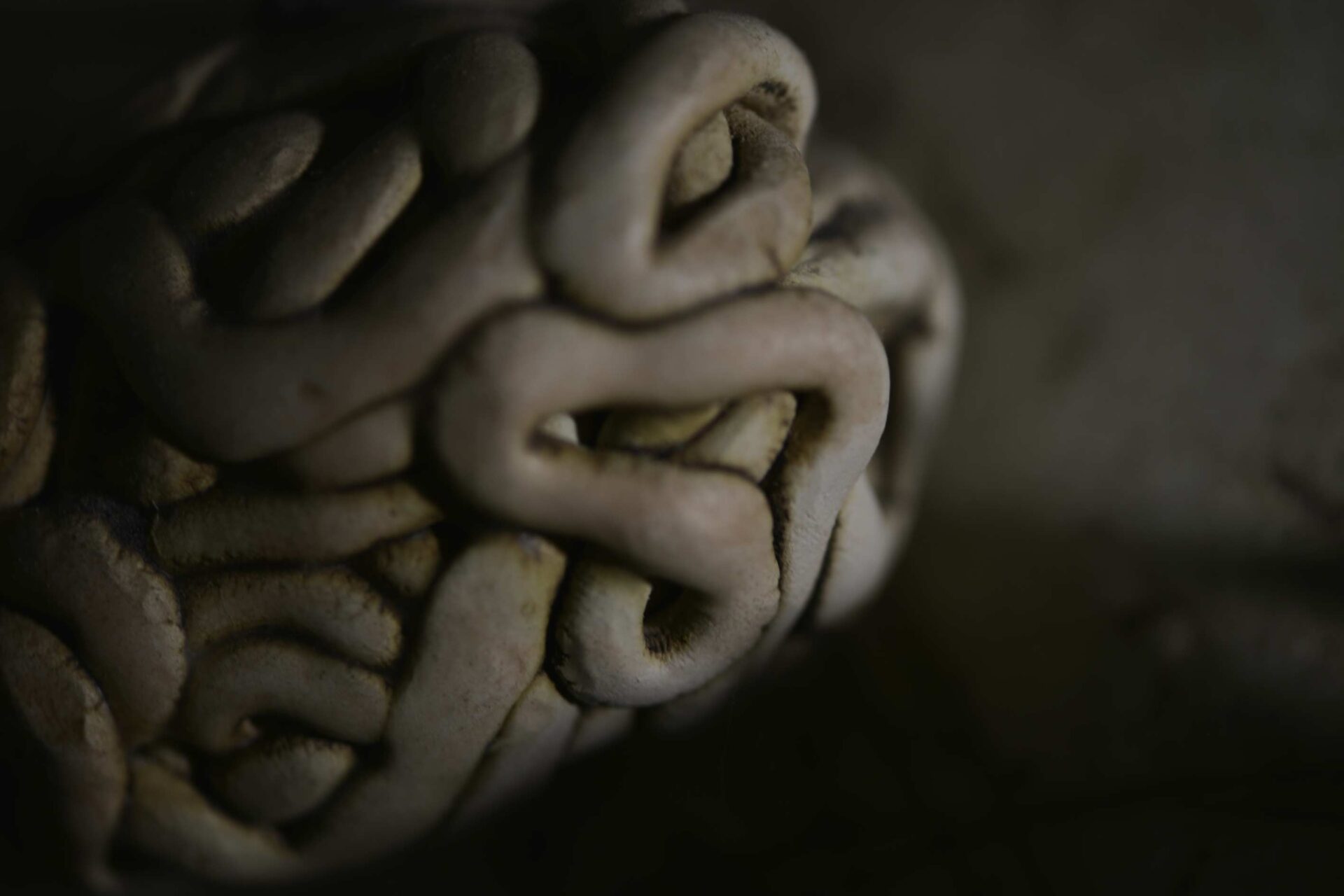 A detail shot of a ceramic sculpture.