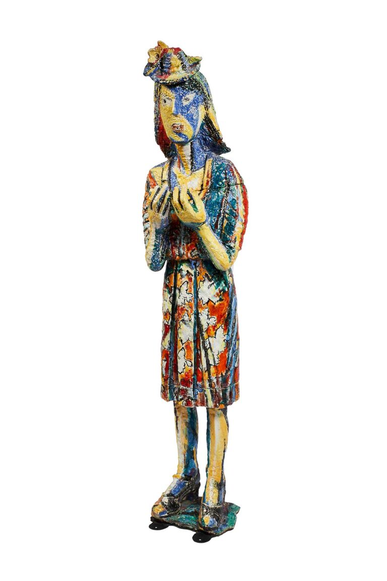 ceramic sculpture of a colorful painted lady