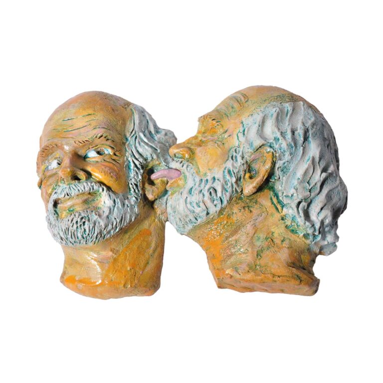 sculpture of two heads with one head licking the other head