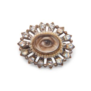 jewelry with diamonds and an eye in the center