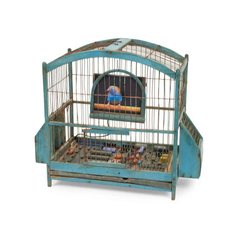 A sculpture of a bird in a cage.