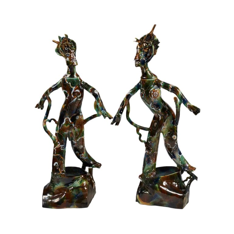 A sculpture of a male and female figure.