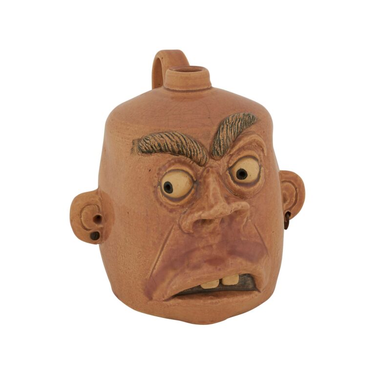 A ceramic sculpture of a head.