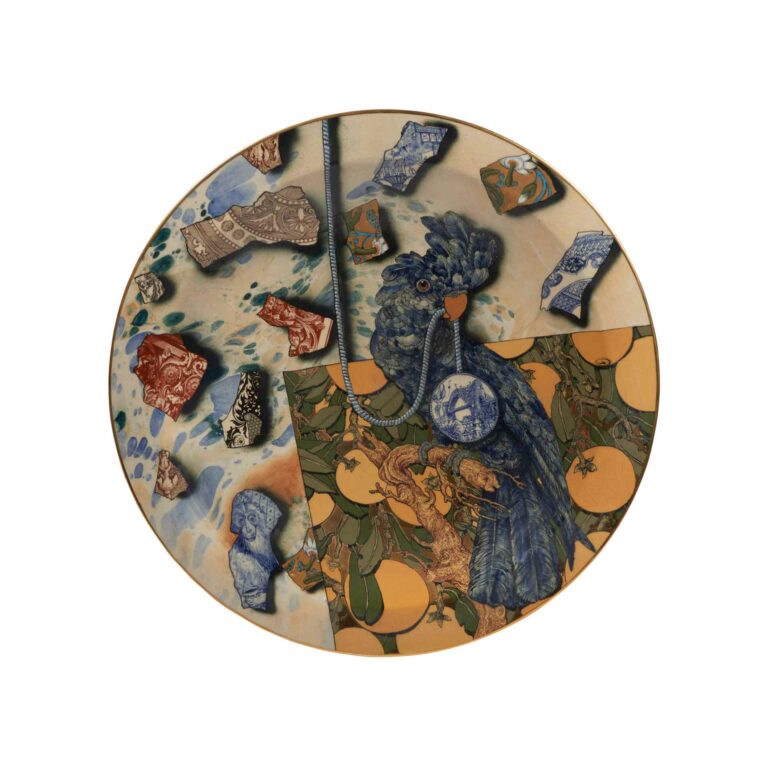 A ceramic plate with a bird on it.