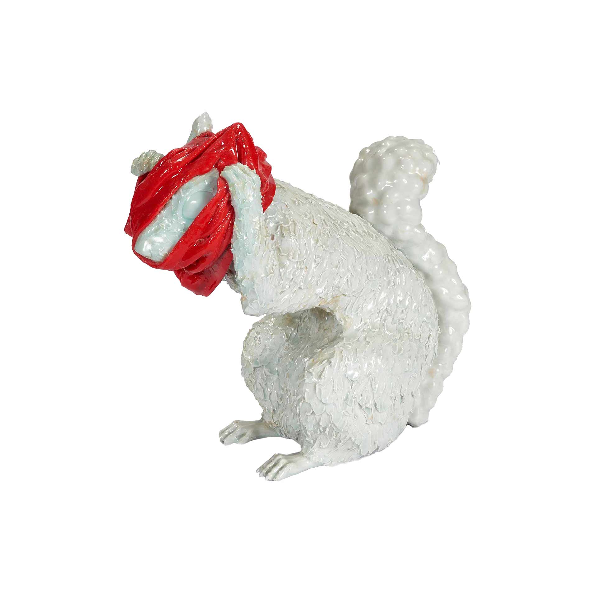 A sculpture of a squirrel.