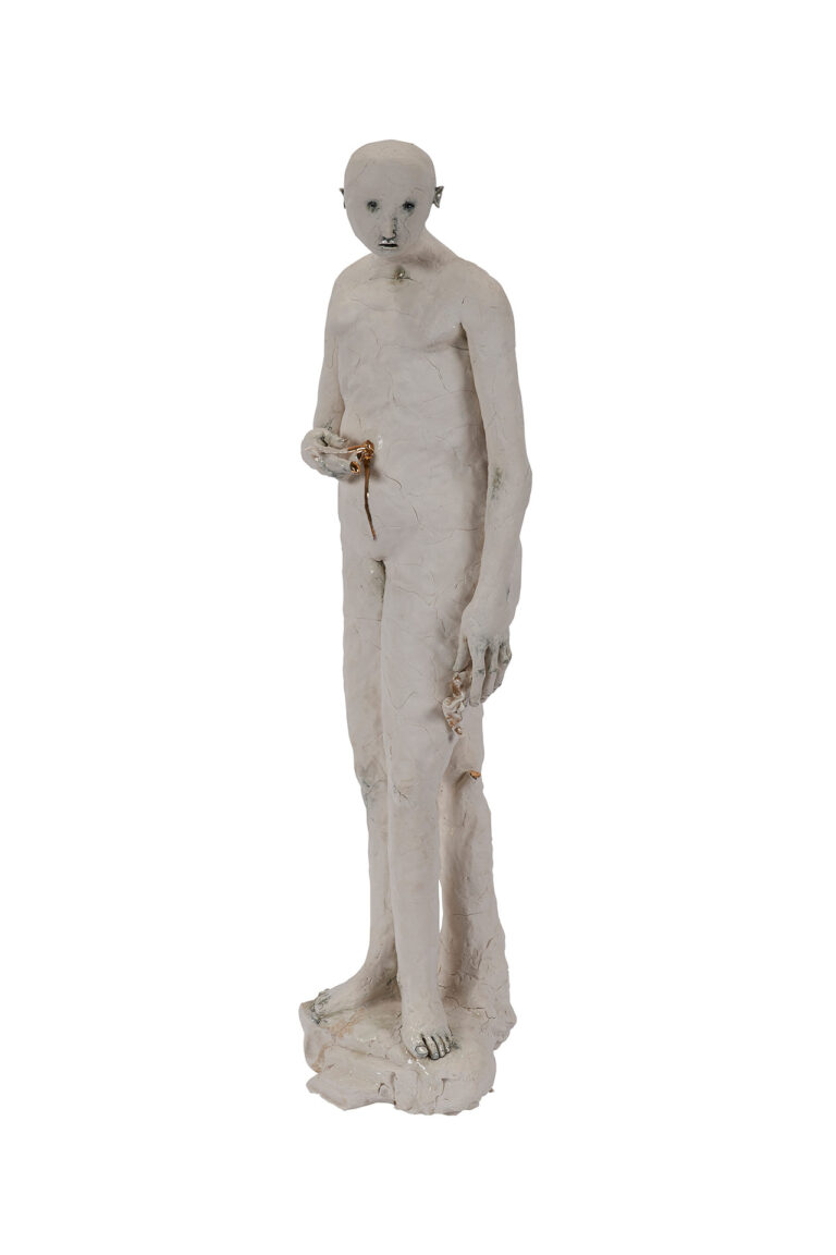 A ceramic sculpture of a figure.