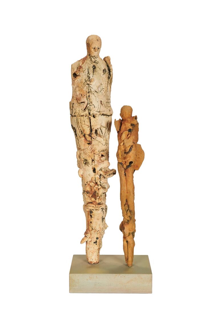 Abstract sculptures of two figures.
