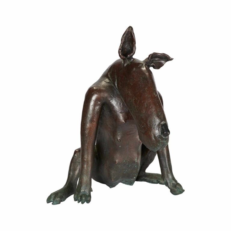 A bronze sculpture of a creature.