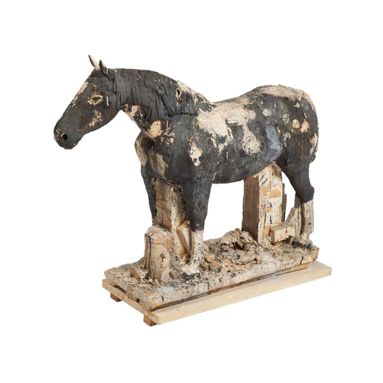 A stoneware sculpture of a horse.