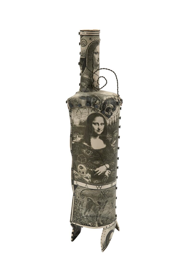 A ceramic sculpture with an image of the mona lisa.