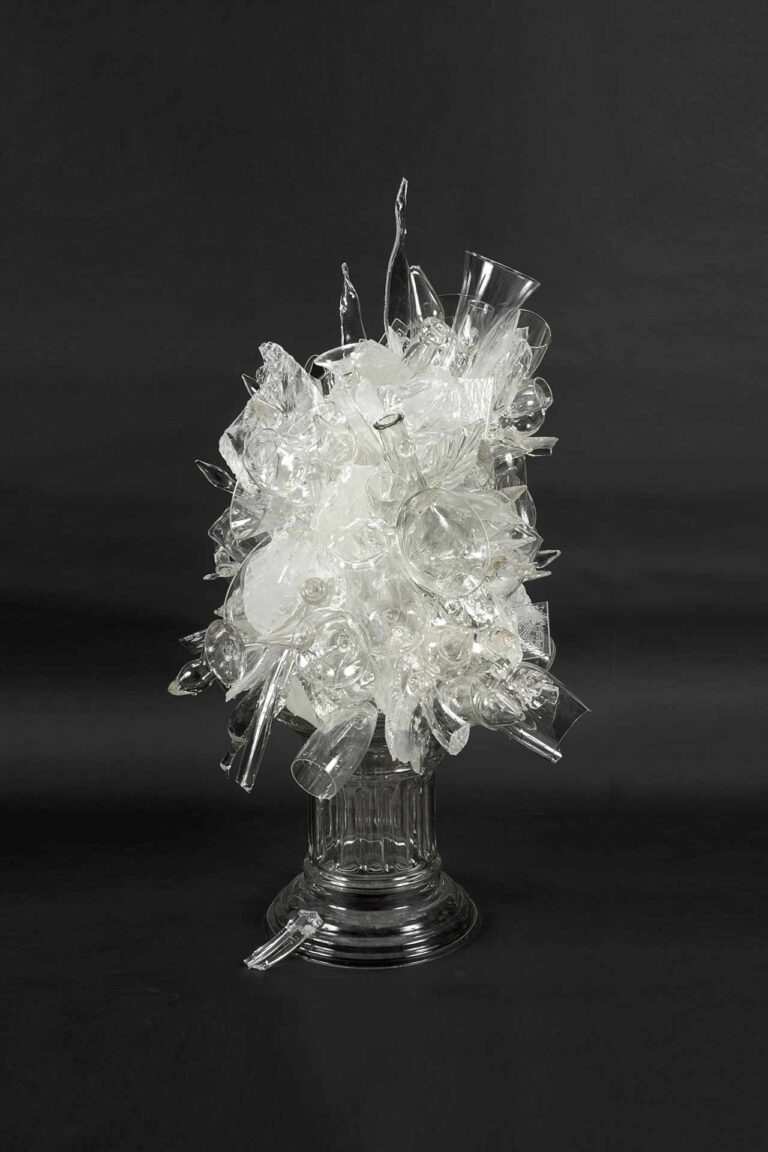 A glass sculpture resembling a bouquet of flowers.