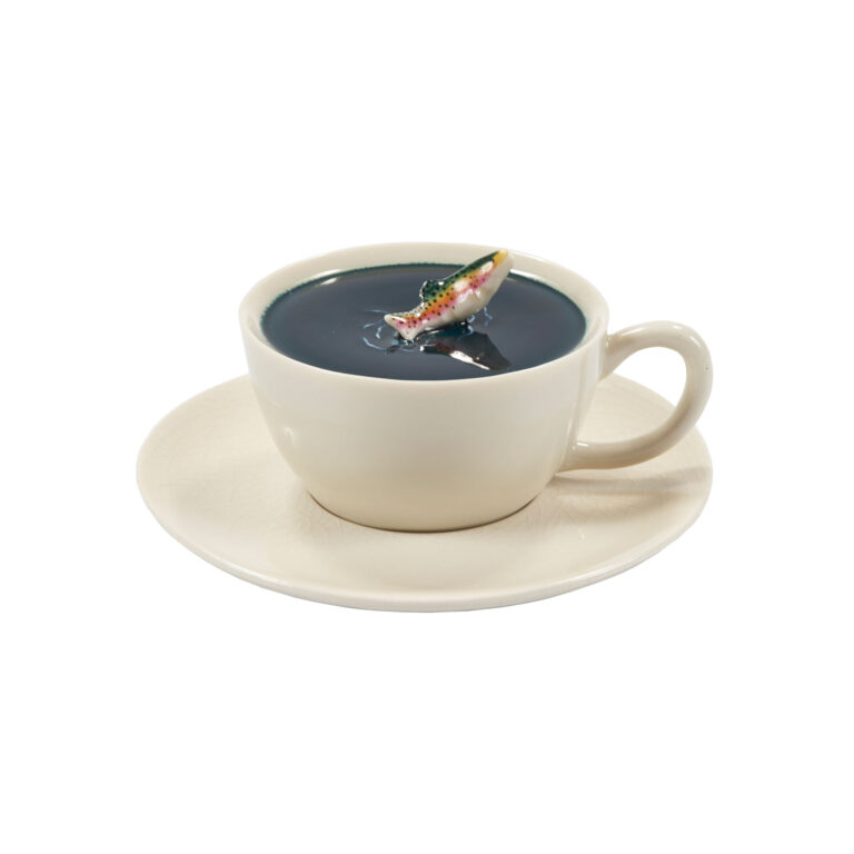 A ceramic cup and saucer.