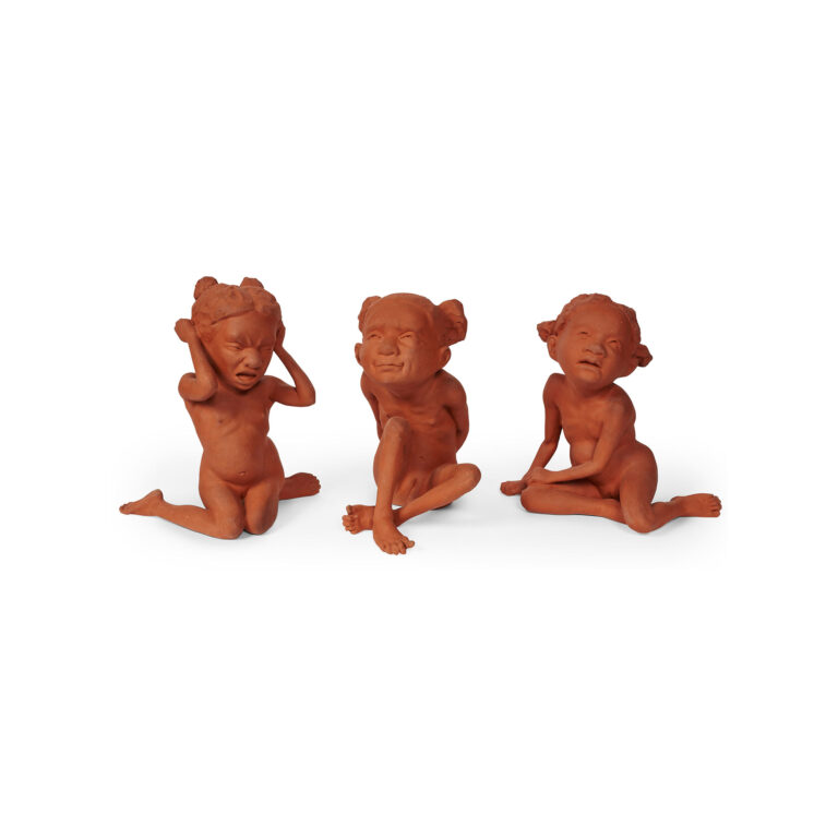 Three clay sculptures of people.