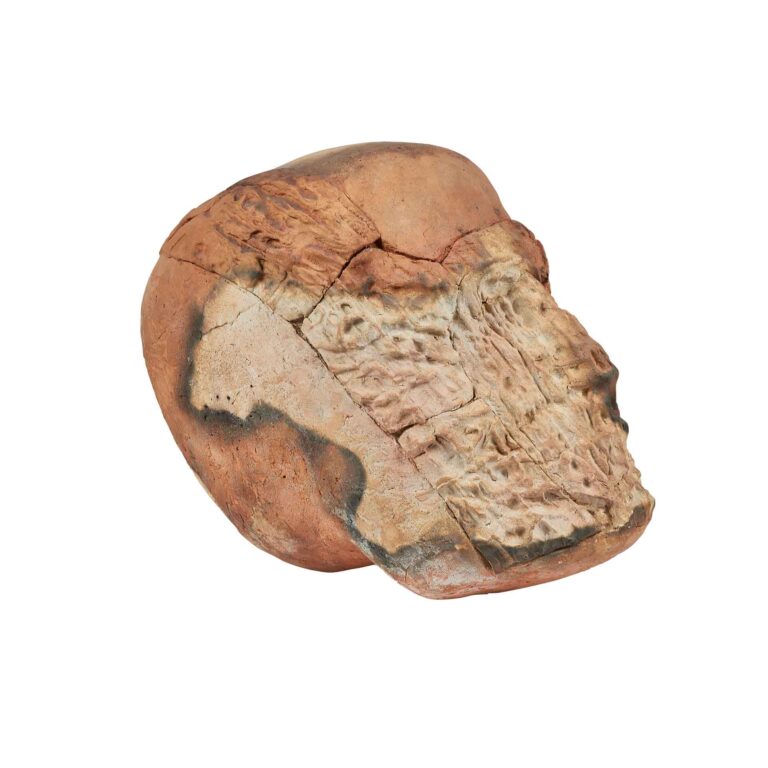 A ceramic sculpture of a head.