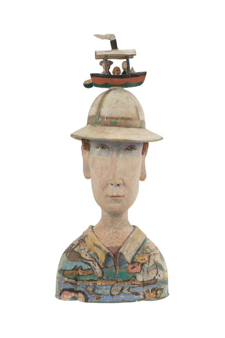 A ceramic sculpture of a man with a boat on his head.