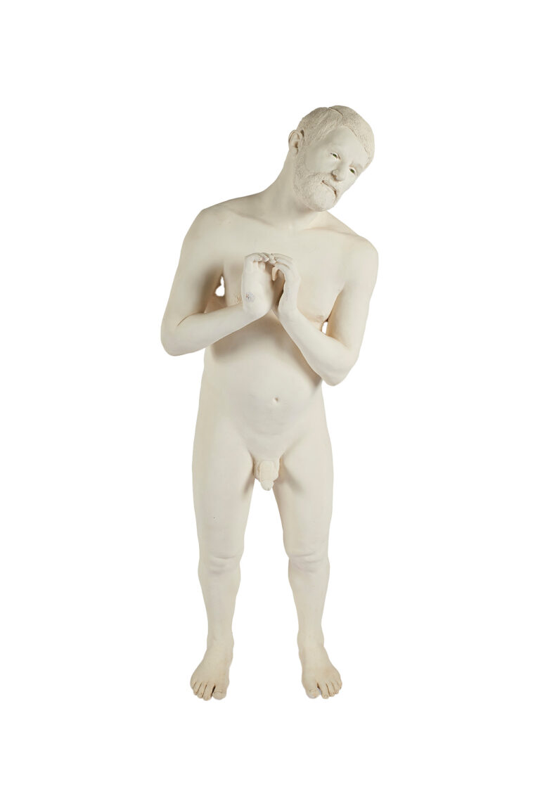 A sculpture of a naked man.