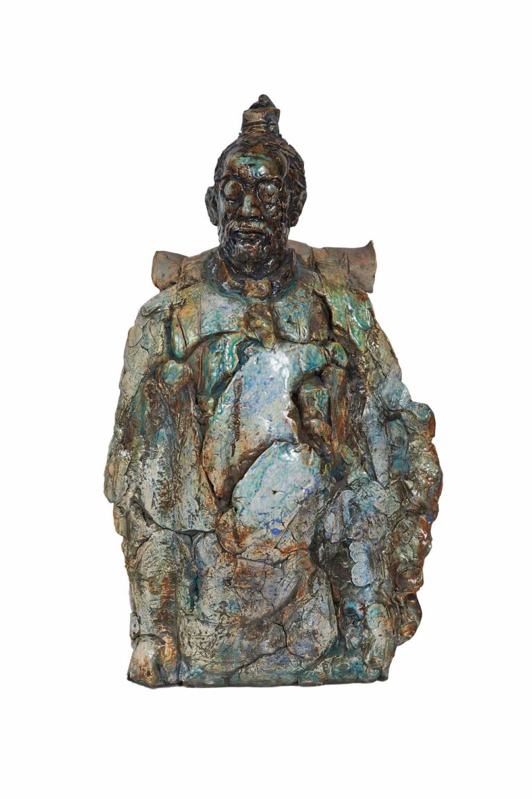 A ceramic sculpture of a figure.