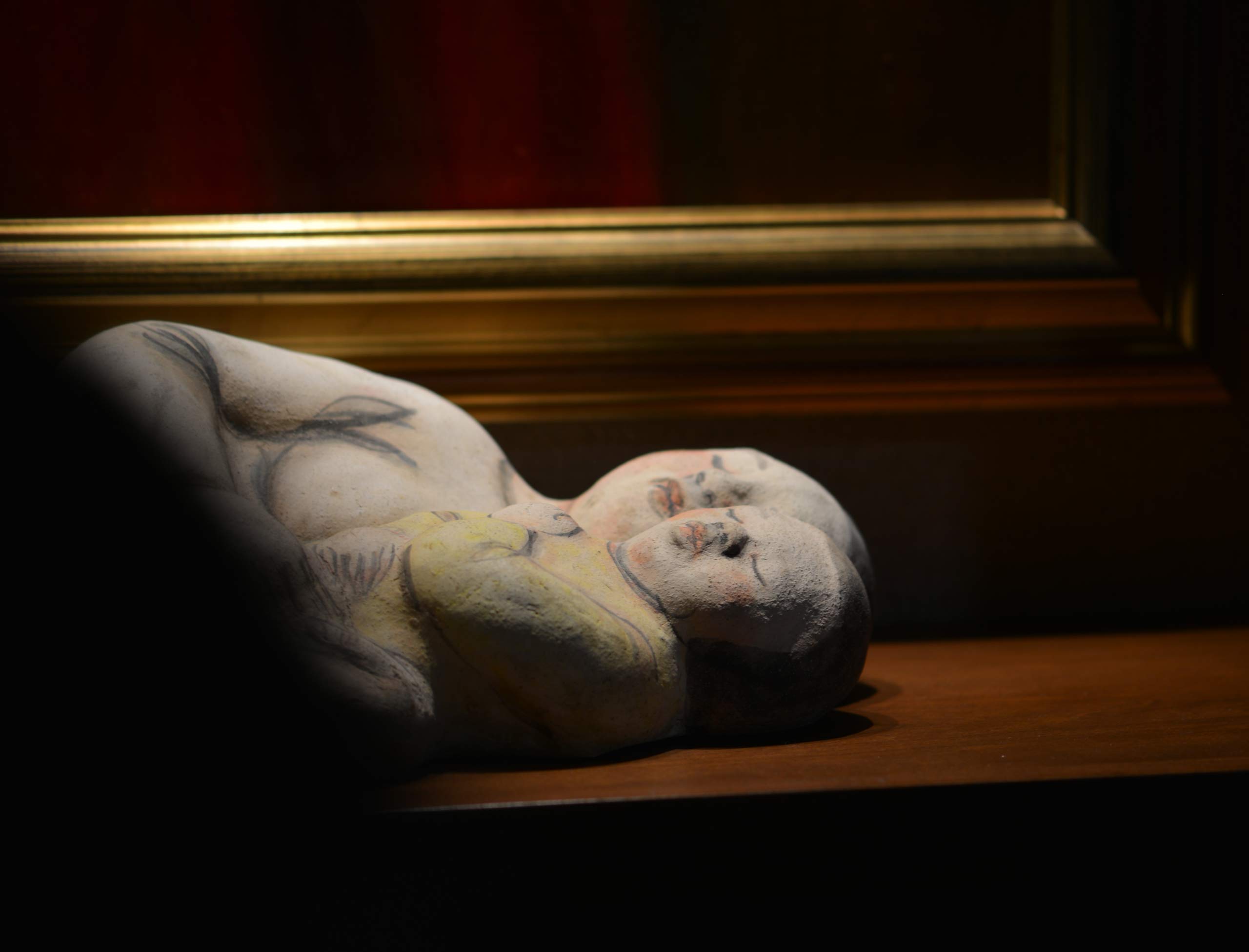 A dramatic image of a sculpture.