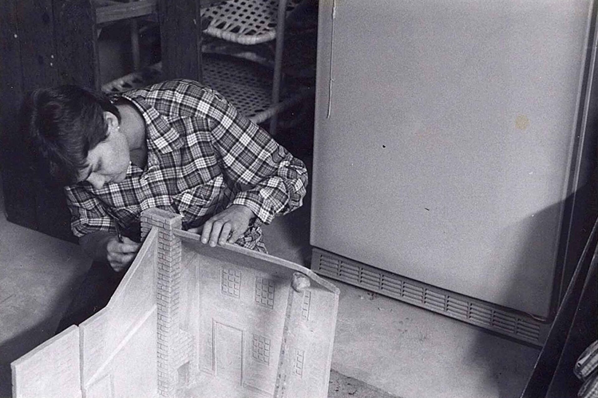 An artist creating a sculpture.